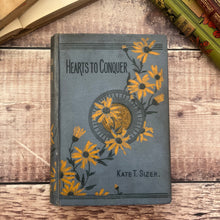 Load image into Gallery viewer, Hearts to Conquer by Kate T Sizer Beautiful Floral Cloth Binding
